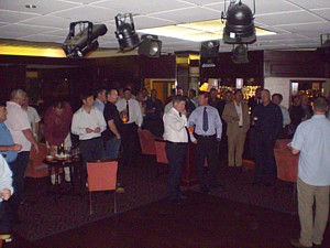 Reunion attendees mustering in the bar 