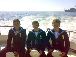 AB Taff Slee, AB Buckley and AB Jay Lynch catch the liberty boat ashore in Sark to attend Church 