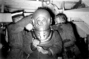 George Wookey being dressed for his world record-breaking dive 12 October 1956  