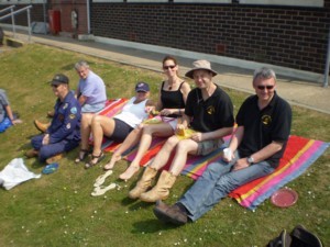 Event organiser Garry Wallace-Potter (in brimmed hat) with his wife Melo