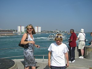 Tina and Louis head for the naval base to greet Dad