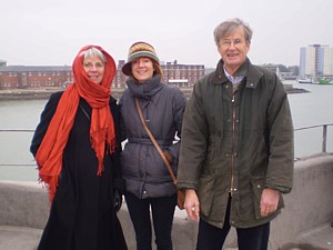 Valerie & Chris Corcoran flanking their daughter Ele