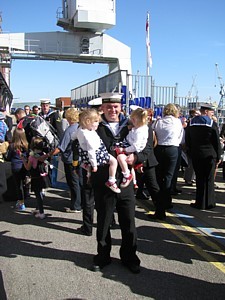 LS(MW) Michael Richardson with his twins, Amber and Daisy