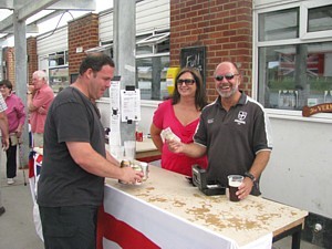 Paul & Yvonne Jones tending the bar at the Horsea Island barbecue 2009