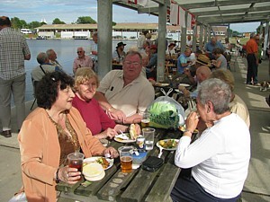 Bill McGovern sitting with Edda Rae, Irene Strange and Kay Haines