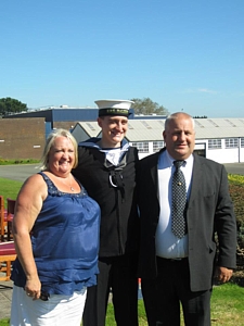 Wendy & Jim Carlin flanking their son James after his initial training