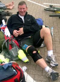  Ian Fleming recovering after his 65-mile run  which left his feet heavily blistered.