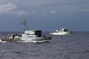 FGS Homberg and HMS Roebuck manoeuvre close to HMS Ledbury in a recent navigation exercise